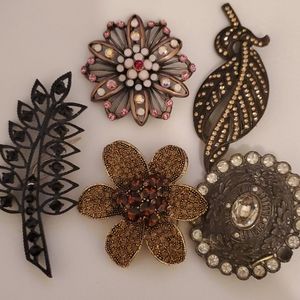 Brown and black brooches